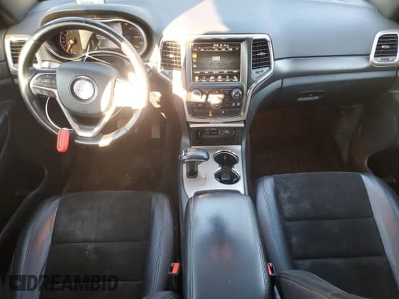 2015 Jeep Grand Cherokee Altitude z VIN 1C4RJFAG8FC730460, wystawiony jako Copart lot #70811055 z przebiegiem 227 670 mil mil oraz Czysty tytuł • Clean title. Historia ofert i sprzedaży dostępna na DreamBid. Obrazek 8.