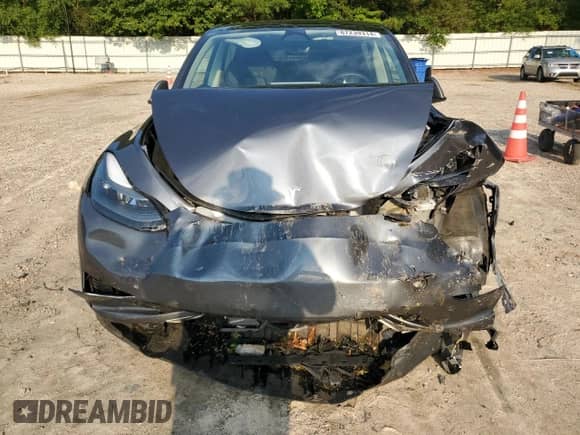 2023 Tesla Model Y Long Range with VIN 7SAYGAEE4PF668889, listed as a Copart auction lot 67239314 with 26,874 mi miles and Salvage title. Bid and sale history available at DreamBid. Image 5.