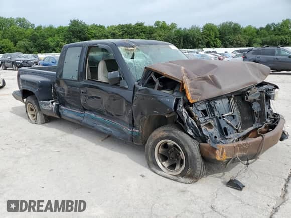 1994 GMC Sierra 1500 z VIN 2GDEC19K9R1550219, wystawiony jako Copart lot #57146345 z przebiegiem 207 808 mil mil oraz Szkoda całkowita • Salvage title. Historia ofert i sprzedaży dostępna na DreamBid. Obrazek 4.