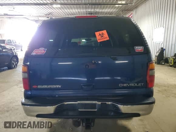 2003 Chevrolet Suburban LT z VIN 1GNFK16Z73J208611, wystawiony jako Copart lot #56168855 z przebiegiem Nie podano mil oraz Nie do naprawy • Non repairable. Historia ofert i sprzedaży dostępna na DreamBid. Obrazek 6.
