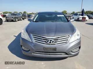 2013 Hyundai Azera с VIN KMHFH4JGXDA322985, выставлен на аукционе Copart как лот 74611094 с пробегом 79 230 миль миль и Чистый • Clean title. История ставок и продаж доступна на DreamBid. Изображение 5.