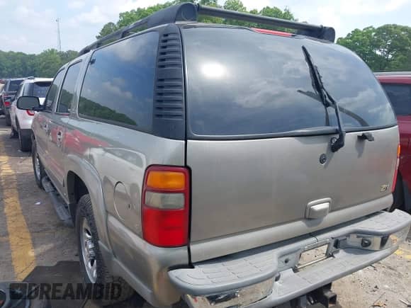 2003 Chevrolet Suburban Z71 with VIN 3GNFK16T93G146920, listed as a IAAI auction lot 42153972 with 195,615 mi miles and . Bid and sale history available at DreamBid. Image 3.