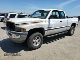 1996 Dodge 1500 with VIN 3B7HF13ZXTG136220, listed as a Copart auction lot 66890095 with 223,592 mi miles and Salvage title. Bid and sale history available at DreamBid. Image 1.