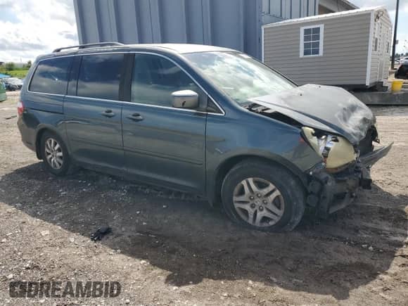 2005 Honda Odyssey EX с VIN 5FNRL38495B401224, выставлен на аукционе Copart как лот 80556355 с пробегом 258 303 миль миль и Списание • Salvage title. История ставок и продаж доступна на DreamBid. Изображение 4.