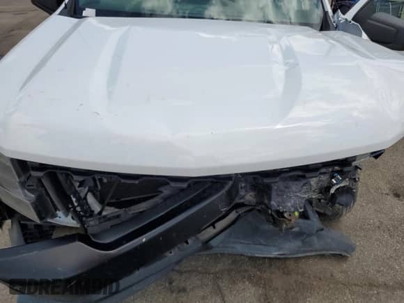 2020 Chevrolet Silverado 1500 Work Truck z VIN 1GCRWAEF6LZ172056, wystawiony jako Copart lot #61770935 z przebiegiem 56 828 mil mil oraz Szkoda całkowita • Salvage title. Historia ofert i sprzedaży dostępna na DreamBid. Obrazek 11.