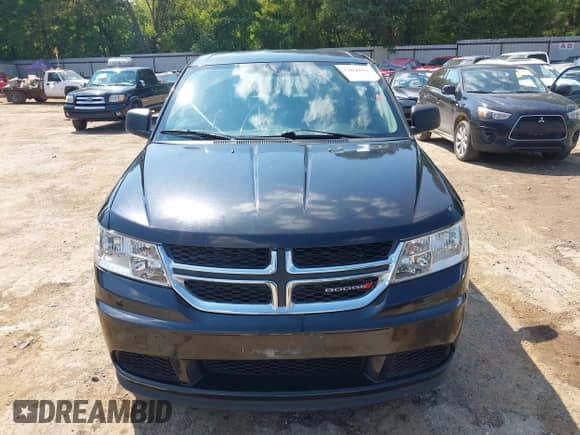 2013 Dodge Journey American Value z VIN 3C4PDCAB1DT665342, wystawiony jako IAAI lot #43204169 z przebiegiem 165 036 mil mil oraz . Historia ofert i sprzedaży dostępna na DreamBid. Obrazek 12.