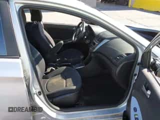 2015 Hyundai Accent GS z VIN KMHCT5AE4FU206771, wystawiony jako IAAI lot #43200865 z przebiegiem 77 934 mil mil oraz . Historia ofert i sprzedaży dostępna na DreamBid. Obrazek 5.