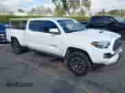 2020 Toyota Tacoma SR5 z VIN 3TMBZ5DN7LM026596, wystawiony jako IAAI lot #40705410 z przebiegiem 123 489 mil mil oraz . Historia ofert i sprzedaży dostępna na DreamBid. Obrazek 1.