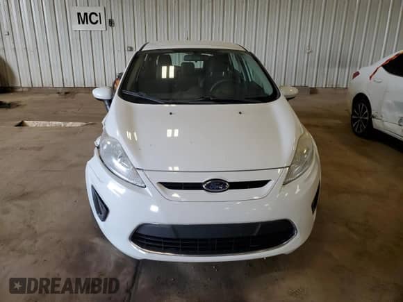 2012 Ford Fiesta SE with VIN 3FADP4EJ0CM128803, listed as a Copart auction lot 66608965 with 77,095 mi miles and Clean title. Bid and sale history available at DreamBid. Image 5.