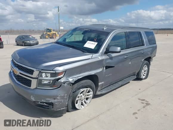 2019 Chevrolet Tahoe LS with VIN 1GNSKAKC7KR347704, listed as a IAAI auction lot 41532849 with 219,466 mi miles and . Bid and sale history available at DreamBid. Image 6.