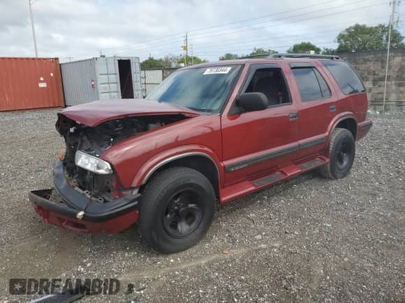 1999 Chevrolet Blazer LS z VIN 1GNCS13W2X2156012, wystawiony jako Copart lot #79730344 z przebiegiem 142 788 mil mil oraz Szkoda całkowita • Salvage title. Historia ofert i sprzedaży dostępna na DreamBid. Obrazek 1.