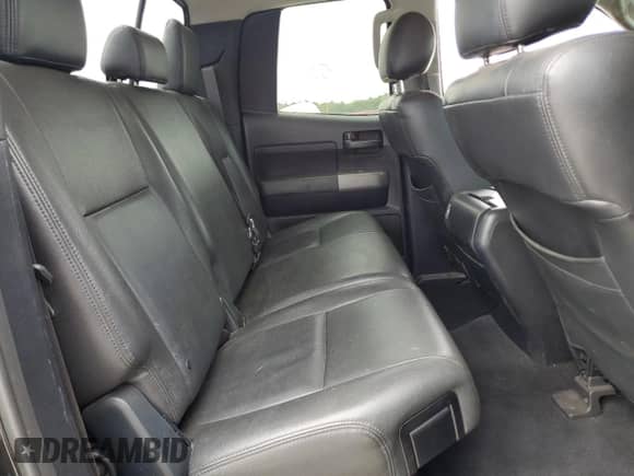 2013 Toyota Tundra z VIN 5TFUM5F1XDX046077, wystawiony jako Copart lot #65893365 z przebiegiem 240 153 mil mil oraz Szkoda całkowita • Salvage title. Historia ofert i sprzedaży dostępna na DreamBid. Obrazek 10.