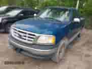 1999 Ford F-150 XL with VIN 1FTRX17L0XNC07560, listed as a IAAI auction lot 42183858 with Not provided miles and . Bid and sale history available at DreamBid. Image 2.