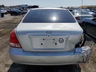 2003 Hyundai Elantra GLS z VIN KMHDN45D63U679190, wystawiony jako Copart lot #70321904 z przebiegiem 197 627 mil mil oraz Szkoda całkowita • Salvage title. Historia ofert i sprzedaży dostępna na DreamBid. Obrazek 6.