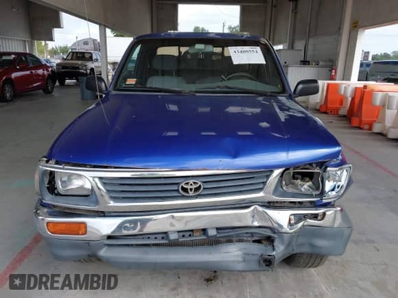 1995 Toyota Tacoma z VIN 4TAVN53F9SZ023310, wystawiony jako IAAI lot #43400554 z przebiegiem 311 607 mil mil oraz . Historia ofert i sprzedaży dostępna na DreamBid. Obrazek 12.