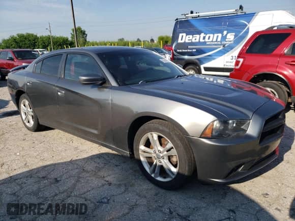 2011 Dodge Charger RT with VIN 2B3CM5CT2BH610941, listed as a Copart auction lot 63684095 with 153,143 mi miles and Clean title. Bid and sale history available at DreamBid. Image 4.
