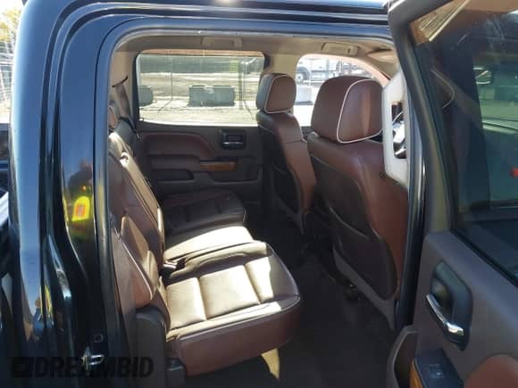 2014 Chevrolet Silverado 1500 High Country z VIN 3GCUKTEJ3EG291028, wystawiony jako IAAI lot #43475348 z przebiegiem 154 289 mil mil oraz . Historia ofert i sprzedaży dostępna na DreamBid. Obrazek 8.