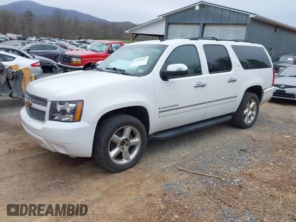 2014 Chevrolet Suburban LTZ with VIN 1GNSKKE77ER152002, listed as a IAAI auction lot 41930865 with 159,393 mi miles and . Bid and sale history available at DreamBid. Image 2.