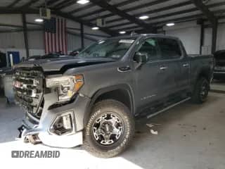 2021 GMC Sierra 1500 SLT with VIN 3GTU9DEDXMG398300, listed as a Copart auction lot 70136995 with 49,426 mi miles and Salvage title. Bid and sale history available at DreamBid. Image 1.
