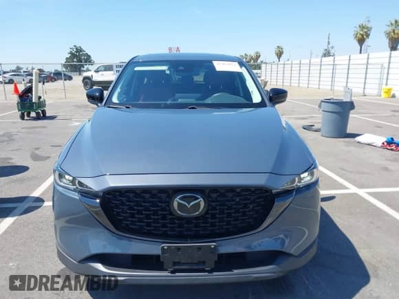 2022 Mazda CX-5 S Carbon Edition z VIN JM3KFBCM7N1601447, wystawiony jako IAAI lot #42463014 z przebiegiem 37 126 mil mil oraz . Historia ofert i sprzedaży dostępna na DreamBid. Obrazek 12.