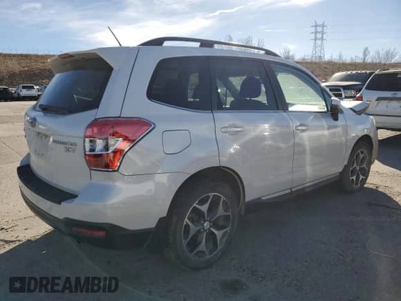 2015 Subaru Forester XT Touring z VIN JF2SJGWC7FH489427, wystawiony jako Copart lot #84101934 z przebiegiem 92 619 mil mil oraz Szkoda całkowita • Salvage title. Historia ofert i sprzedaży dostępna na DreamBid. Obrazek 3.