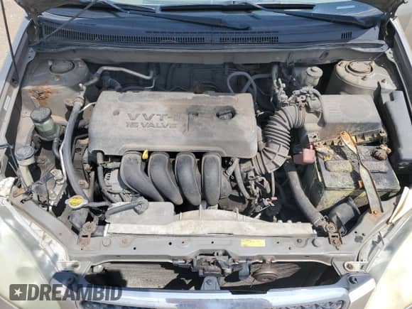 2005 Toyota Corolla CE z VIN 1NXBR32E85Z408881, wystawiony jako Copart lot #65297685 z przebiegiem 299 999 mil mil oraz Szkoda całkowita • Salvage title. Historia ofert i sprzedaży dostępna na DreamBid. Obrazek 11.