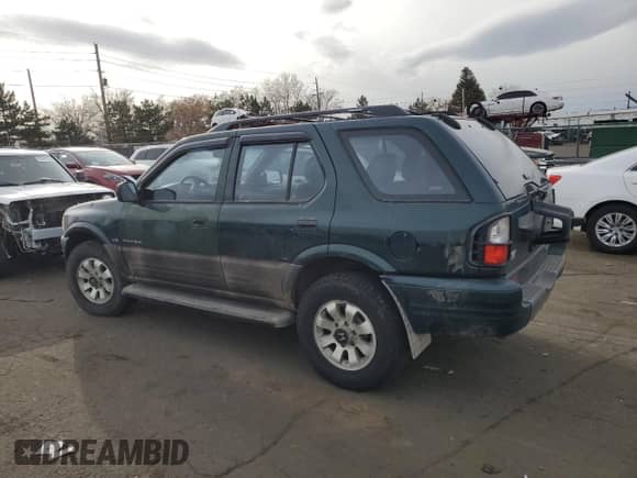 2000 Honda Passport LX с VIN 4S6DM58W0Y4406220, выставлен на аукционе Copart как лот 82774694 с пробегом 171 487 миль миль и Списание • Salvage title. История ставок и продаж доступна на DreamBid. Изображение 2.
