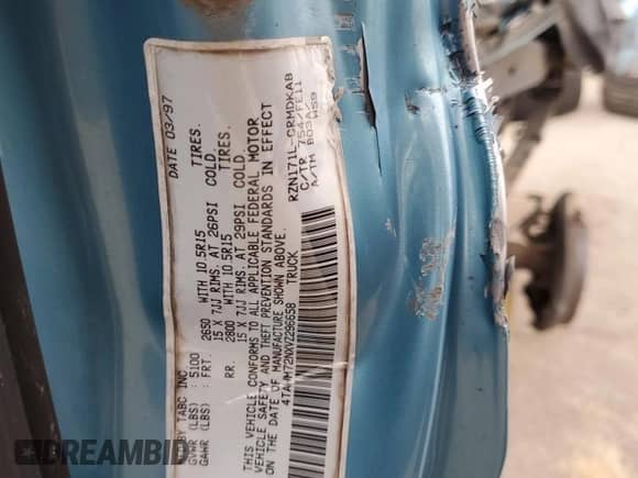 1997 Toyota Tacoma z VIN 4TAWM72NXVZ296658, wystawiony jako Copart lot #78831984 z przebiegiem 228 827 mil mil oraz Szkoda całkowita • Salvage title. Historia ofert i sprzedaży dostępna na DreamBid. Obrazek 13.