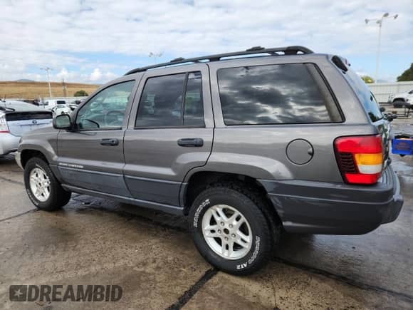 2003 Jeep Grand Cherokee Laredo with VIN 1J4GW48N03C570923, listed as a Copart auction lot 82103275 with 151,784 mi miles and Clean title. Bid and sale history available at DreamBid. Image 2.