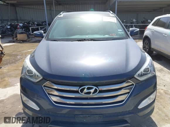 2016 Hyundai Santa Fe z VIN 5XYZW4LA8GG338087, wystawiony jako IAAI lot #41730229 z przebiegiem 156 062 mil mil oraz . Historia ofert i sprzedaży dostępna na DreamBid. Obrazek 12.