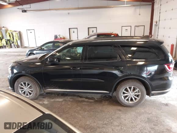 2017 Dodge Durango SXT with VIN 1C4RDJAG6HC771540, listed as a IAAI auction lot 43297775 with 126,329 mi miles and . Bid and sale history available at DreamBid. Image 14.