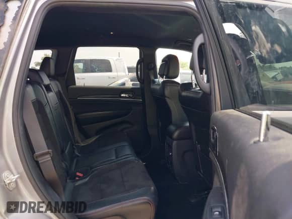 2019 Jeep Grand Cherokee Trailhawk z VIN 1C4RJFLG3KC771909, wystawiony jako IAAI lot #42045267 z przebiegiem 108 084 mil mil oraz . Historia ofert i sprzedaży dostępna na DreamBid. Obrazek 8.