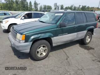 1998 Jeep Grand Cherokee Laredo с VIN 1J4GZ58S3WC258487, выставлен на аукционе Copart как лот 70209995 с пробегом Не указан миль и Чистый • Clean title. История ставок и продаж доступна на DreamBid. Изображение 1.