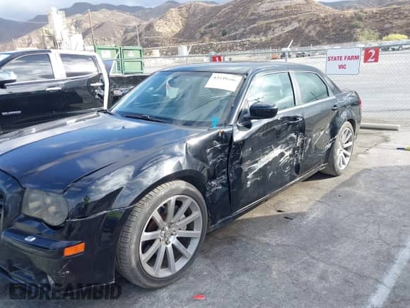 2007 Chrysler 300 C SRT-8 with VIN 2C3LA73W37H658358, listed as a IAAI auction lot 43439006 with 175,088 mi miles and . Bid and sale history available at DreamBid. Image 6.