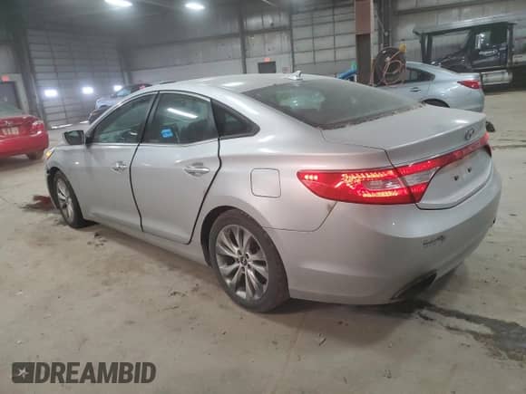2012 Hyundai Azera с VIN KMHFG4JG2CA183114, выставлен на аукционе Copart как лот 82852674 с пробегом 169 546 миль миль и Списание • Salvage title. История ставок и продаж доступна на DreamBid. Изображение 2.