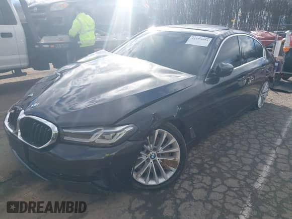 2021 BMW 5 Series 540i xDrive with VIN WBA73BJ02MWX30802, listed as a IAAI auction lot 41195593 with 42,401 mi miles and . Bid and sale history available at DreamBid. Image 2.