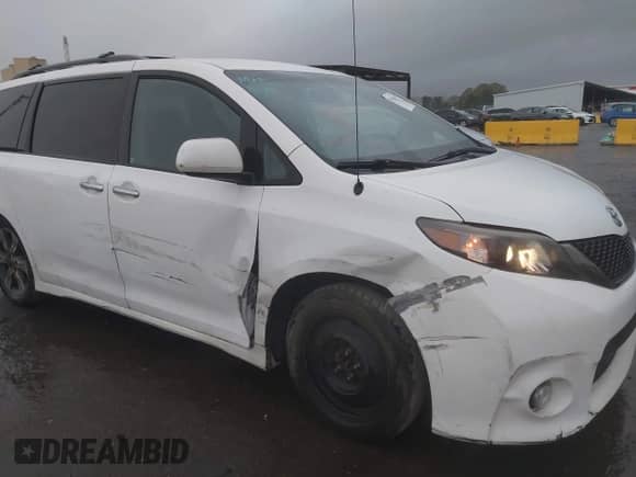 2014 Toyota Sienna SE with VIN 5TDXK3DC8ES441989, listed as a IAAI auction lot 43420437 with 183,733 mi miles and . Bid and sale history available at DreamBid. Image 6.