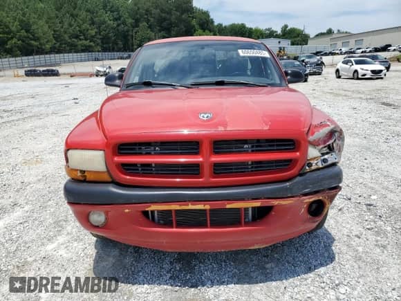 1999 Dodge Dakota SLT with VIN 1B7FL26X6XS117162, listed as a Copart auction lot 60650485 with 120,232 mi miles and Salvage title. Bid and sale history available at DreamBid. Image 5.