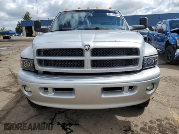 2001 Dodge RAM с VIN 1B7MF33W61J551711, выставлен на аукционе Copart как лот 58213265 с пробегом 104 586 миль миль и Чистый • Clean title. История ставок и продаж доступна на DreamBid. Изображение 5.
