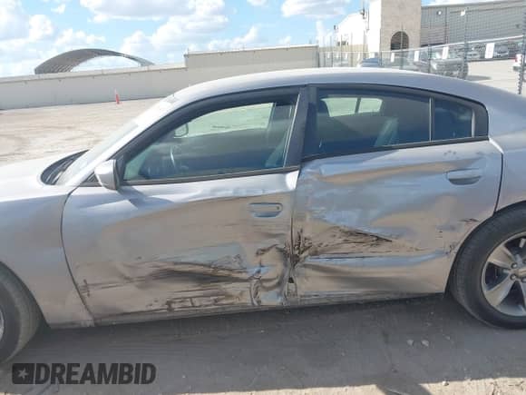 2016 Dodge Charger SXT with VIN 2C3CDXHG0GH196057, listed as a IAAI auction lot 43270915 with 244,696 mi miles and . Bid and sale history available at DreamBid. Image 14.