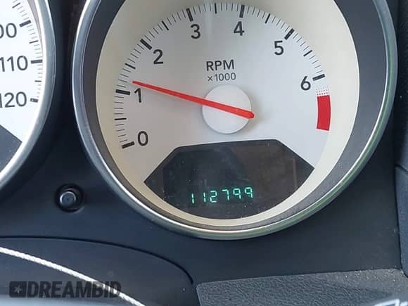 2009 Dodge Caliber SXT with VIN 1B3HB48C29D187901, listed as a IAAI auction lot 42727025 with 112,799 mi miles and . Bid and sale history available at DreamBid. Image 7.