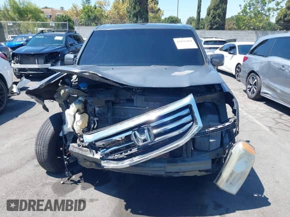 2013 Honda Pilot EX-L with VIN 5FNYF4H57DB020214, listed as a IAAI auction lot 43086404 with 96,173 mi miles and . Bid and sale history available at DreamBid. Image 12.