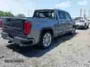 2020 GMC Sierra 1500 Denali with VIN 1GTU9FEL5LZ176121, listed as a IAAI auction lot 42469907 with 84,406 mi miles and . Bid and sale history available at DreamBid. Image 4.