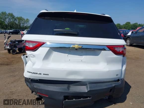 2019 Chevrolet Traverse LT Cloth z VIN 1GNEVGKW2KJ269249, wystawiony jako IAAI lot #42836941 z przebiegiem 74 886 mil mil oraz . Historia ofert i sprzedaży dostępna na DreamBid. Obrazek 16.