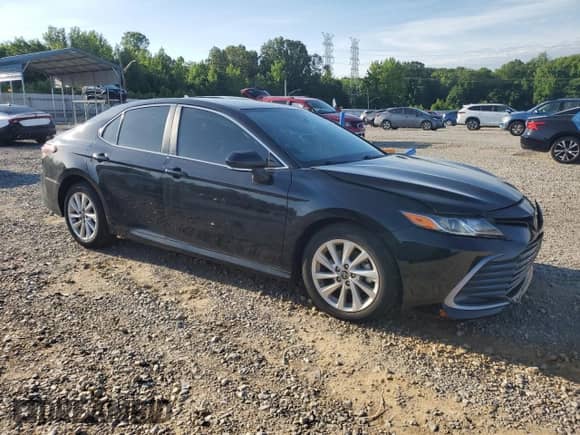 2023 Toyota Camry LE with VIN 4T1R11AK7PU084875, listed as a Copart auction lot 55857395 with 26,473 mi miles and Salvage title. Bid and sale history available at DreamBid. Image 4.