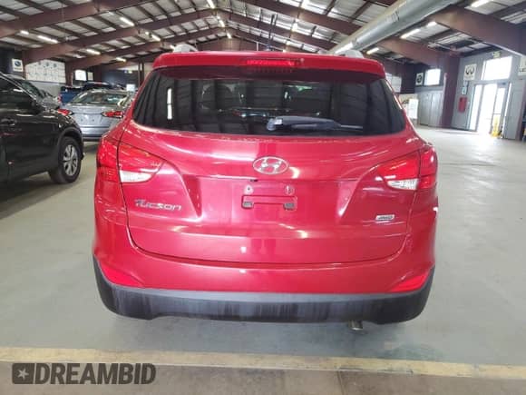 2015 Hyundai Tucson SE z VIN KM8JUCAG6FU974956, wystawiony jako Copart lot #69148475 z przebiegiem 99 898 mil mil oraz Czysty tytuł • Clean title. Historia ofert i sprzedaży dostępna na DreamBid. Obrazek 6.