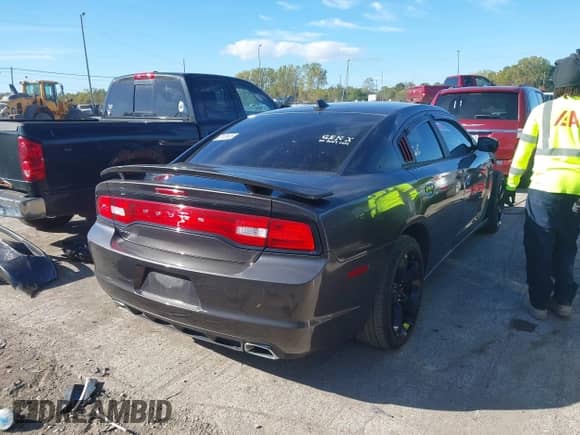 2014 Dodge Charger SXT с VIN 2C3CDXHG3EH219215, выставлен на аукционе IAAI как лот 43434314 с пробегом 104 541 миль миль и . История ставок и продаж доступна на DreamBid. Изображение 4.