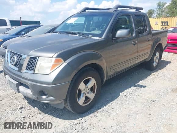 2006 Nissan Frontier SE with VIN 1N6AD07U56C454184, listed as a IAAI auction lot 43271341 with 291,527 mi miles and . Bid and sale history available at DreamBid. Image 2.