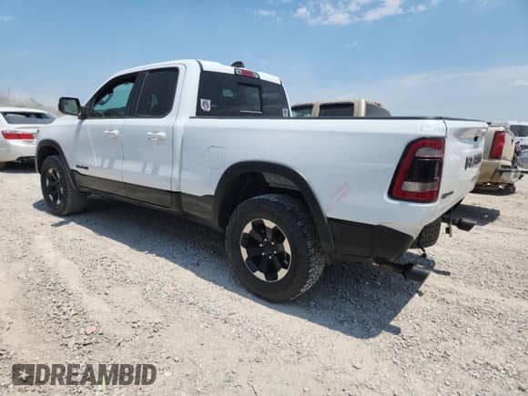 2020 Ram 1500 Rebel with VIN 1C6SRFET1LN318213, listed as a Copart auction lot 64110665 with 131,610 mi miles and Salvage title. Bid and sale history available at DreamBid. Image 2.