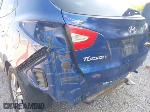 2014 Hyundai Tucson SE with VIN KM8JU3AGXEU804730, listed as a IAAI auction lot 43154883 with 116,472 mi miles and . Bid and sale history available at DreamBid. Image 18.